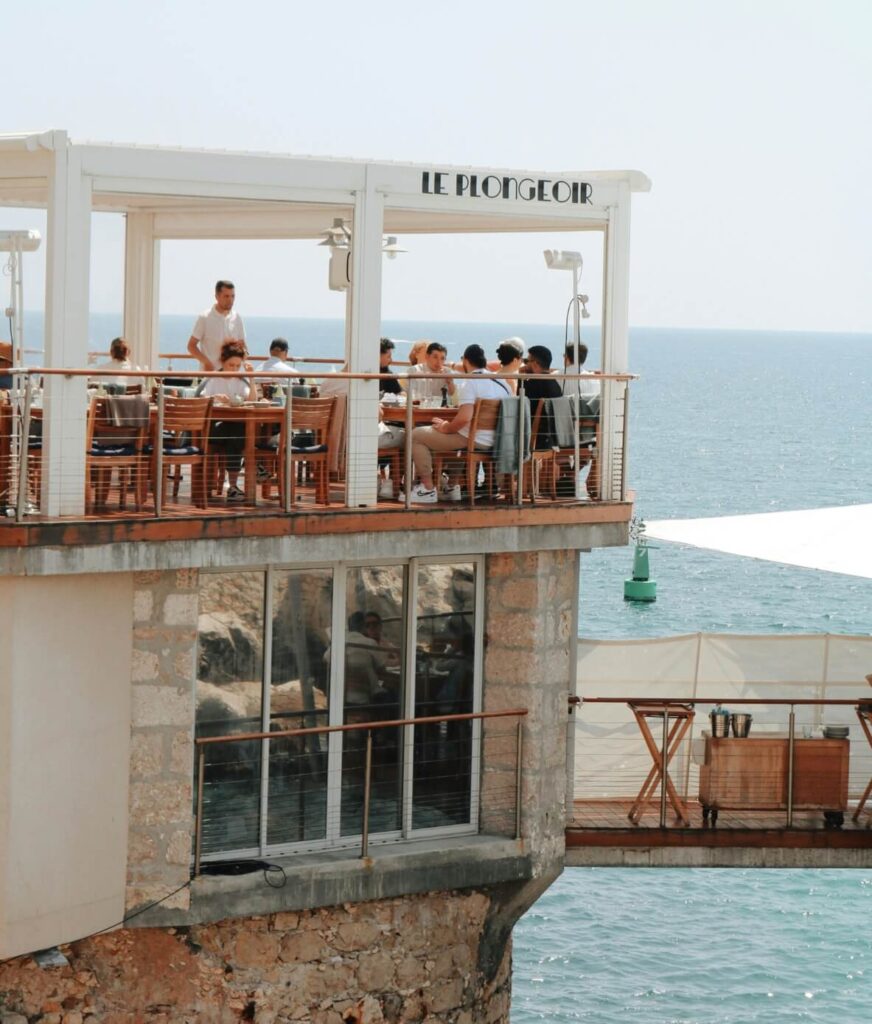 Le Plongeoir, a stone built port restaurant, offers rooftop dining in Nice and is perched above the glittering, topaz Mediterranean Sea.