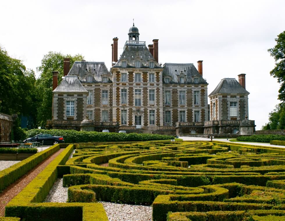 Château de Balleroy overlooks the intricate labyrinth gardens and walking paths.