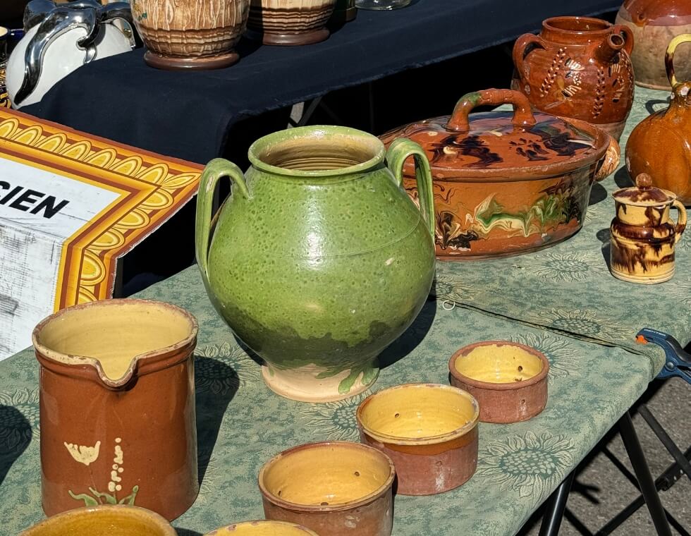 Green and brown French ceramic pots and vases at Villeneuve les Avignon market.