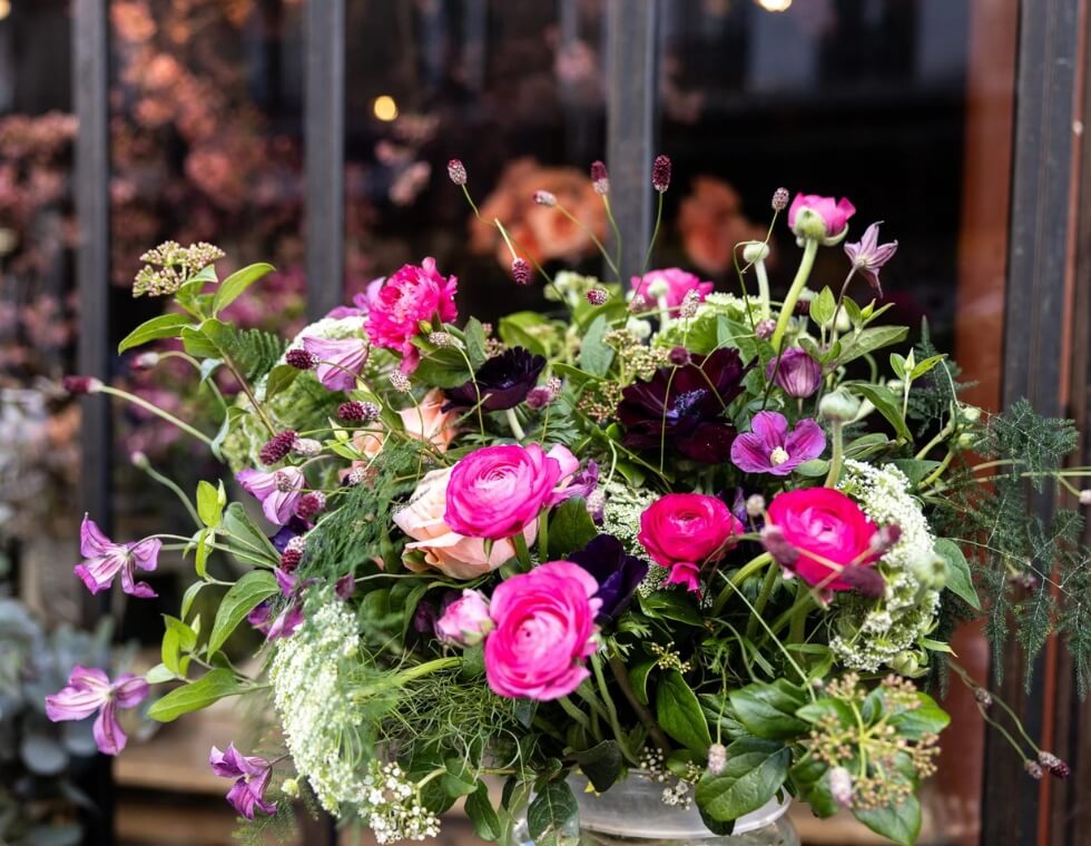 Colorful bouquet arrangement at L’Arrosoir, Parisian floral shop