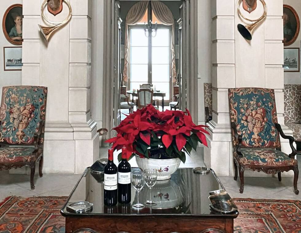 Interior of Château du Taillan with a mix of modern and historic decorative accents, featuring wine from the vineyard.