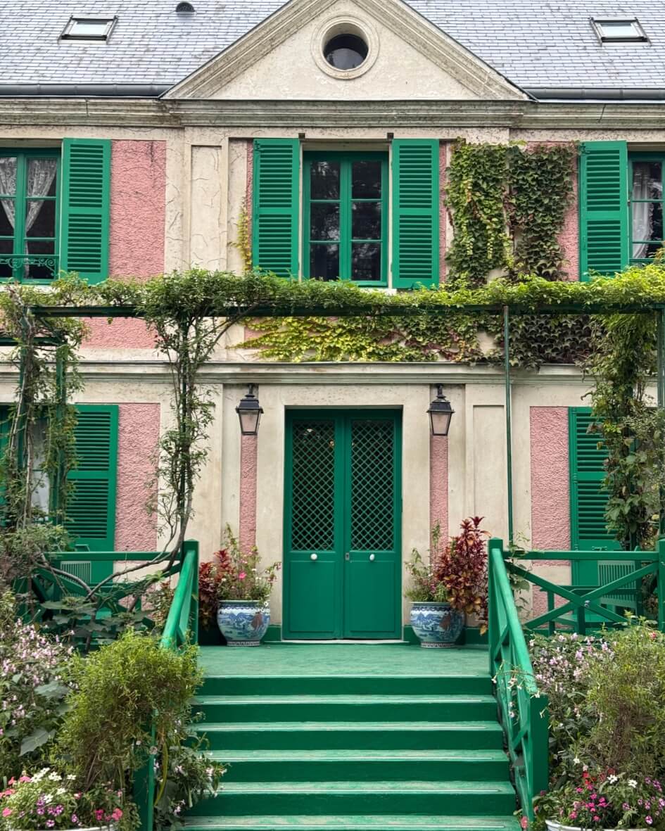 Entrance to Claude Monet’s home in Giverny, Normandy, adorned with blooming ivy.