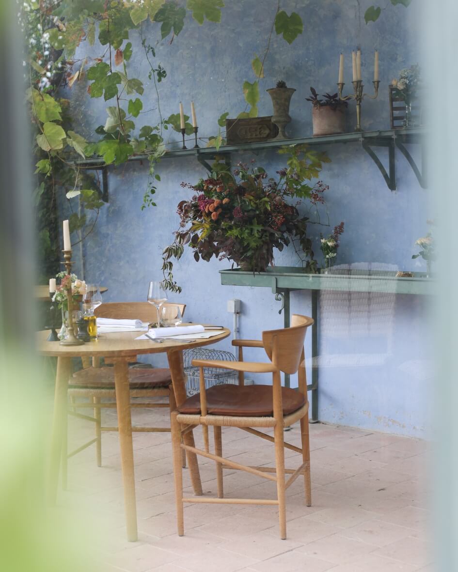 Intimate rustic dining at the Domaine de Primard estate in Normandy, France.