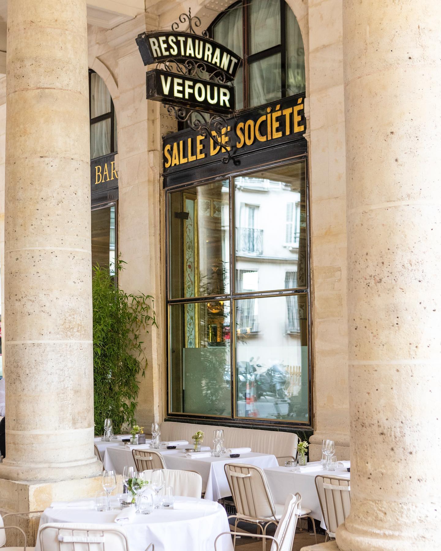 Le Grand Vefour restaurant in Paris, France featuring shaded terrace dining.