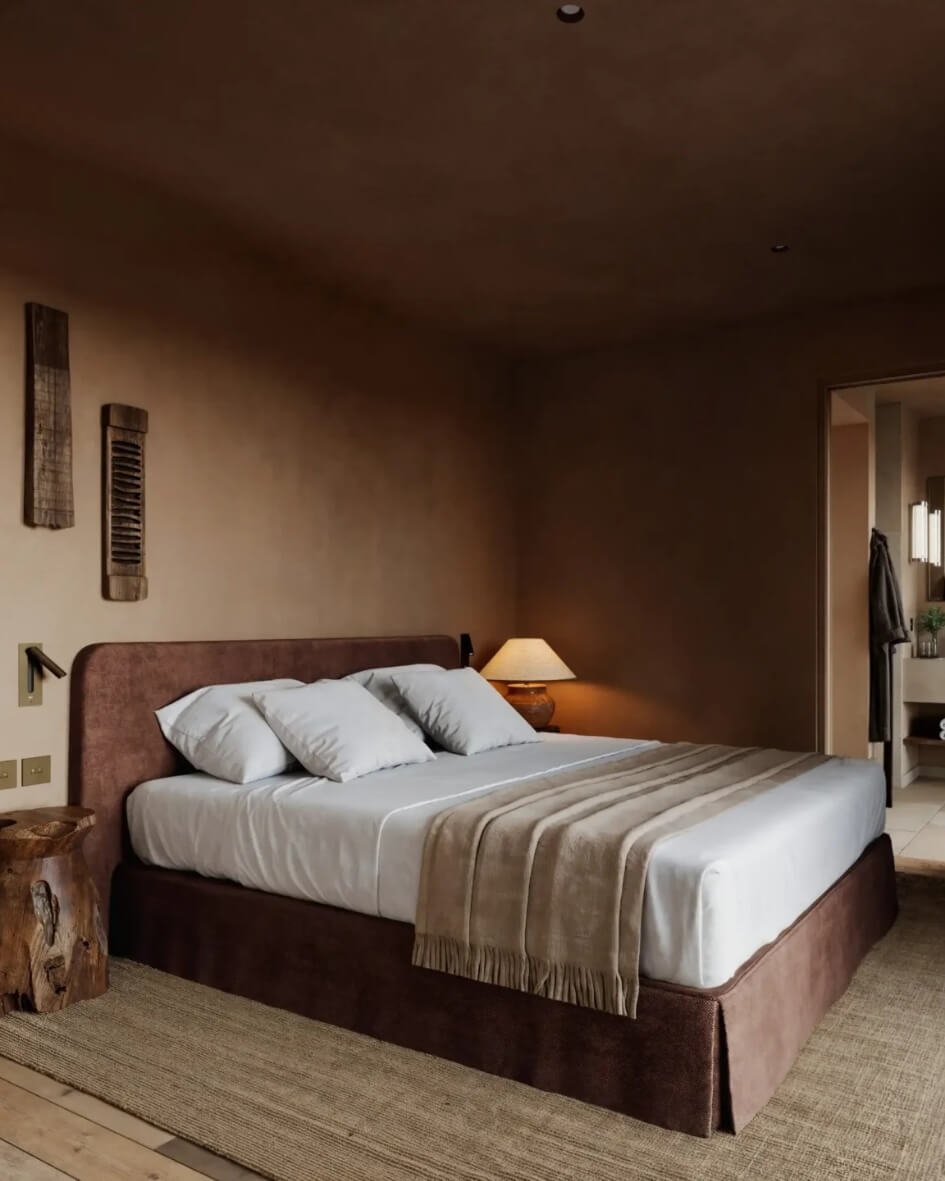 Zannier Le Chalet hotel room in Megève, France with soft moody lighting and modern design accents.