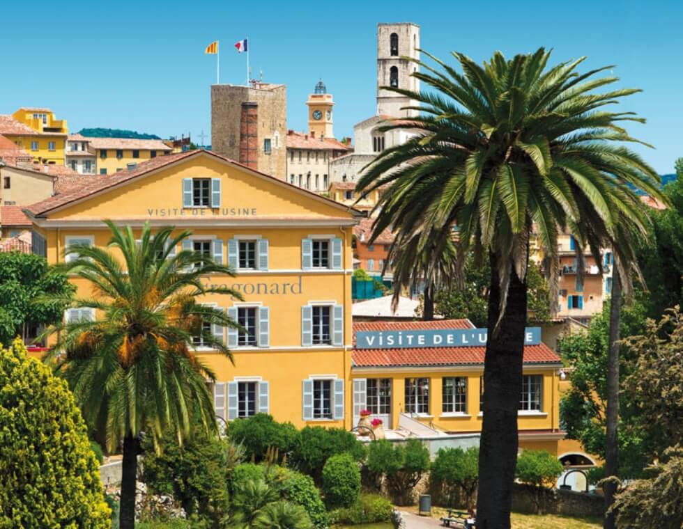 Fragonard perfumery in Grasse, France surrounded by palm trees in summertime.