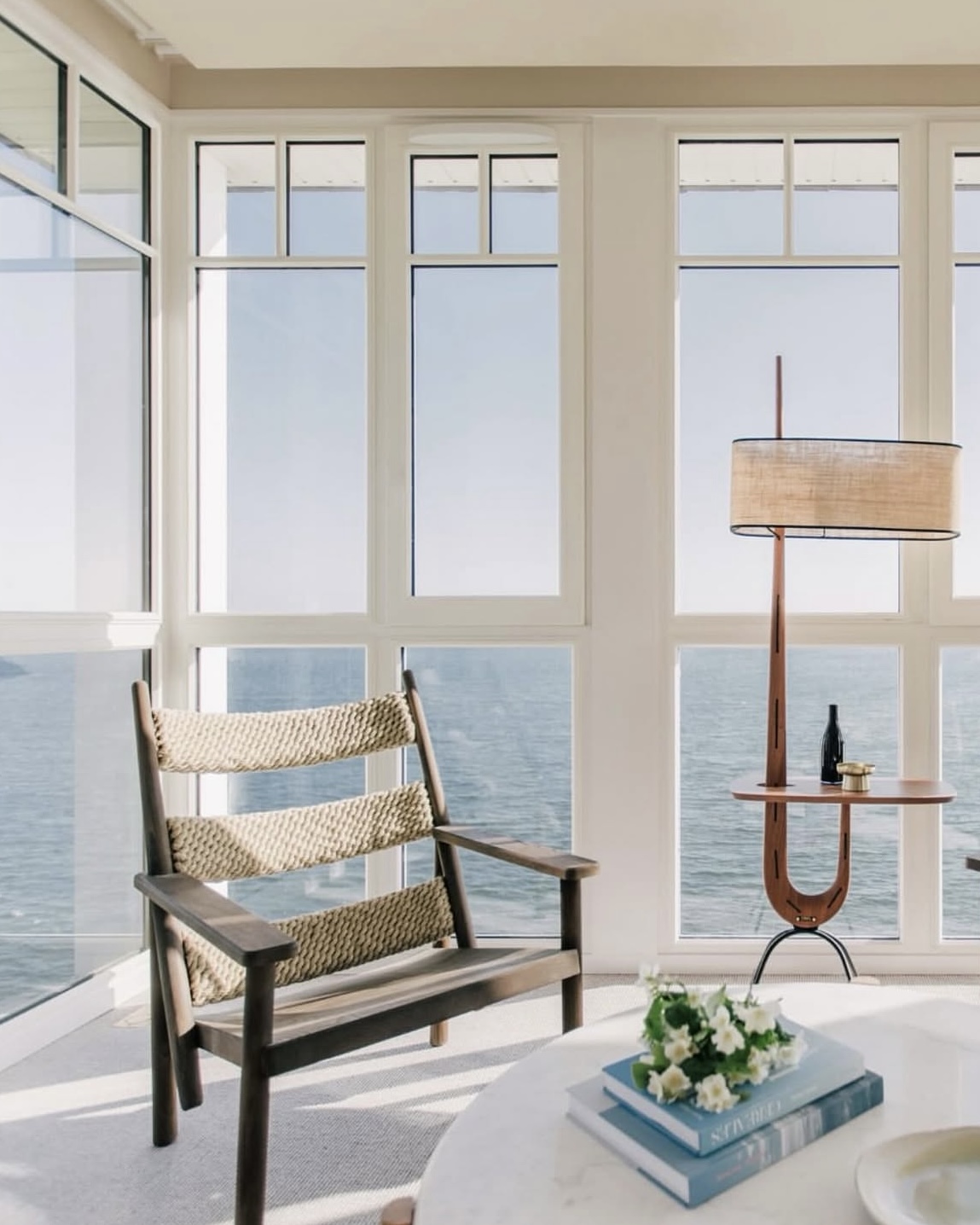 Sunroom at Domaine de Fontenille hotel overlooking the blue Mediterranean Sea in Provence, France.