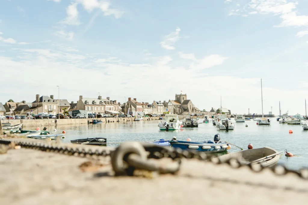 Barfleur port in Normandy, France with moored fishing boats.