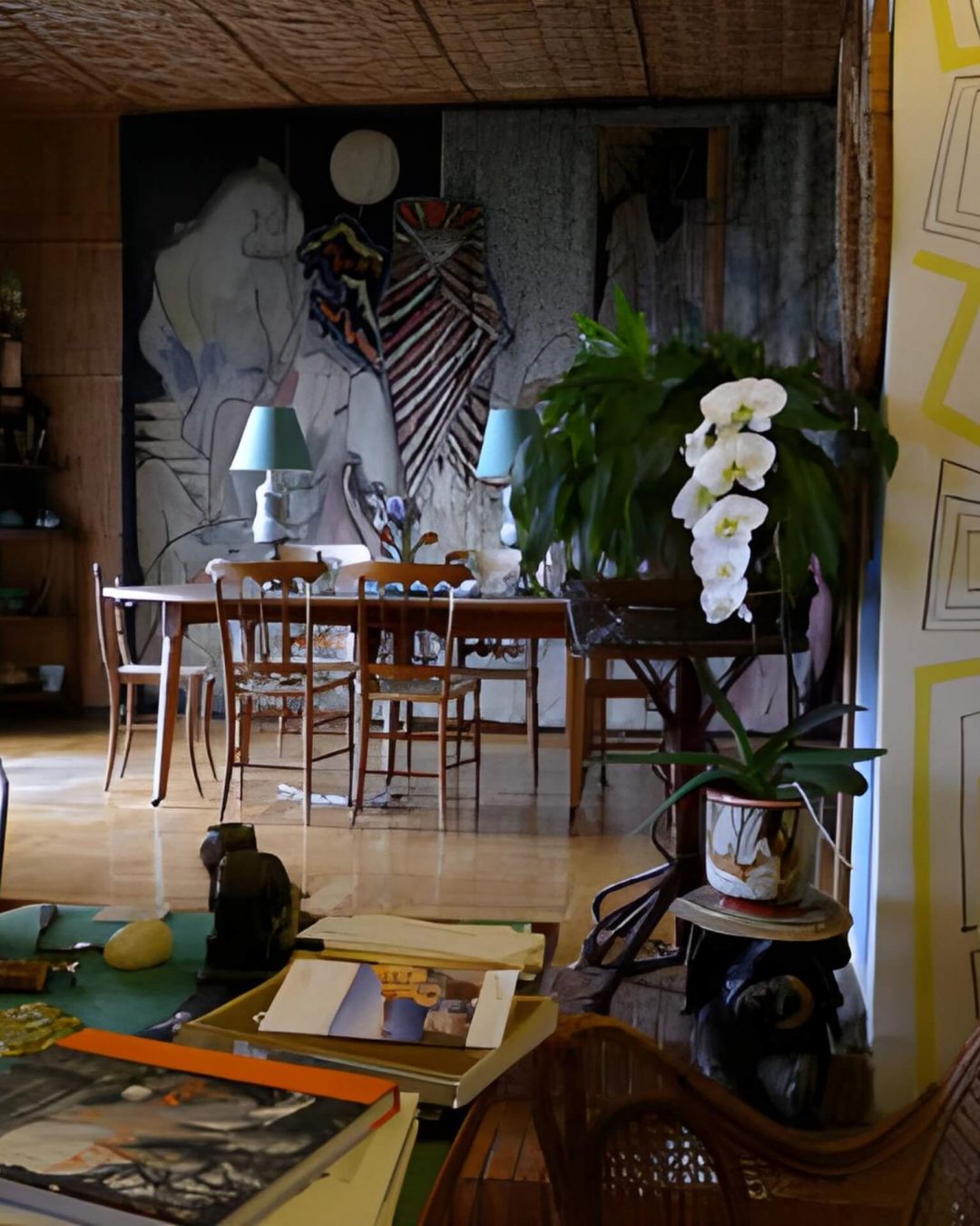 Santo Sospir villa interior on the French Riviera with art and a dining room table.
