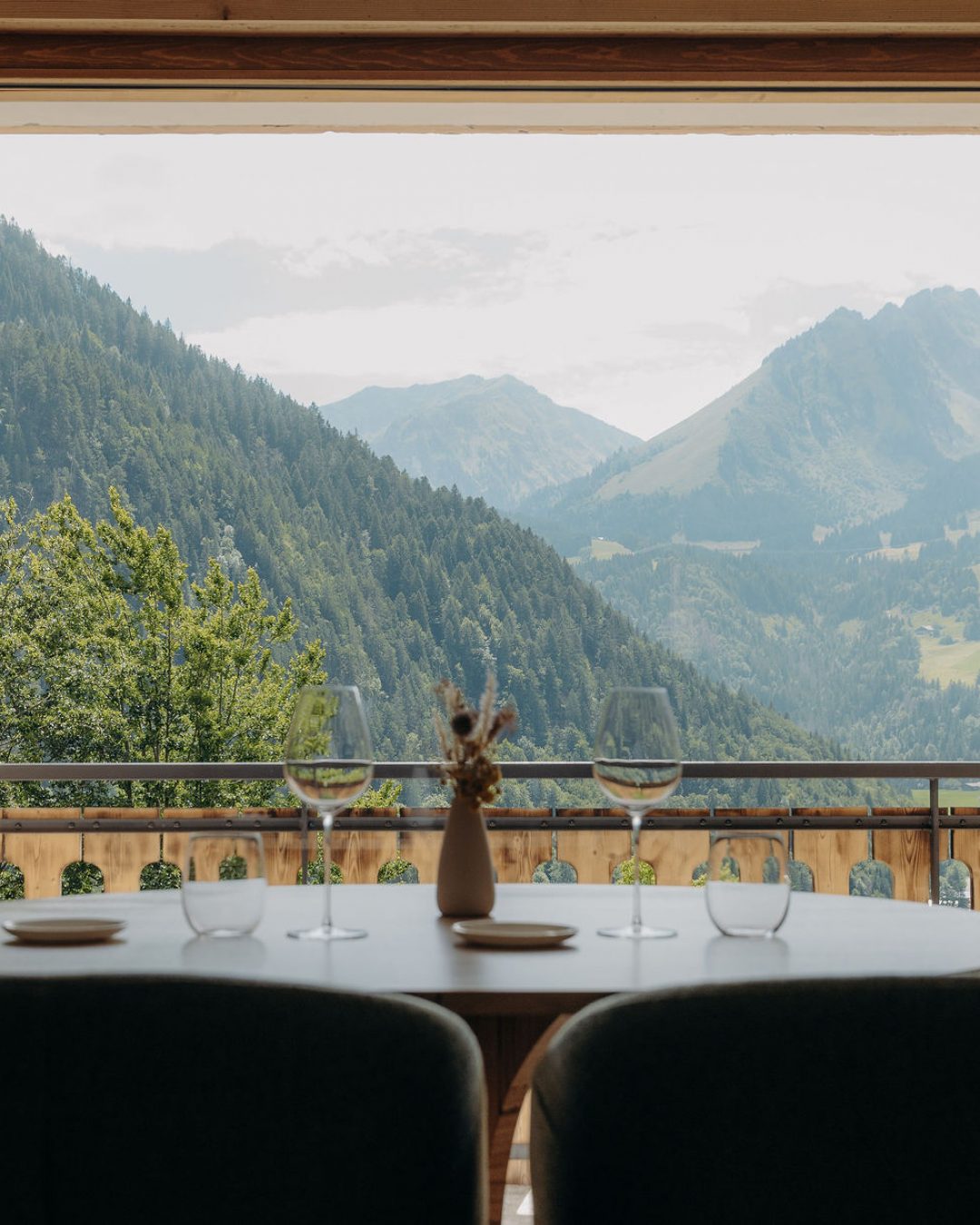 Green mountain view from Michelin Star Chalet Flachaire restaurant along the French Alps.